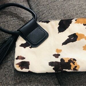 Hobo wristlet cow print and black